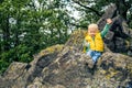 Little boy hiking in mountins, small adventure