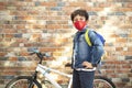 Little boy with his bike ready to go to school Royalty Free Stock Photo