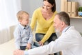 Little boy with his mother at paediatrician on consultation Royalty Free Stock Photo