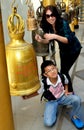 Chiang Mai, TH: People Ringing Temple Bells Royalty Free Stock Photo