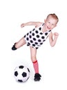 Little boy hits a soccer ball Royalty Free Stock Photo