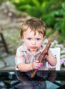 Little Boy Holding a Chocolate Bunny Royalty Free Stock Photo