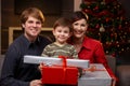 Little boy holding christmas presents Royalty Free Stock Photo