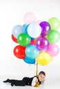 Little boy holding colorful balloons Royalty Free Stock Photo