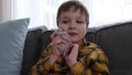 little boy holding a cute fluffy hamster