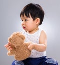 Little boy holding doll bear Royalty Free Stock Photo