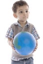 Little boy holding the earth over white background Royalty Free Stock Photo