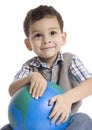 Little boy holding the earth over white background Royalty Free Stock Photo