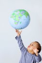 Little boy holding a globe Royalty Free Stock Photo