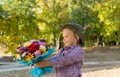 Little boy holding out a floral bouquet Royalty Free Stock Photo