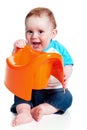 Little boy holding potty Royalty Free Stock Photo