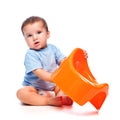 Little boy holding potty Royalty Free Stock Photo
