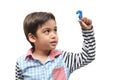 Little boy holding question mark sign Royalty Free Stock Photo