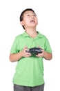 Little boy holding a radio remote control (controlling handset) for helicopter , drone or plane Isolated Royalty Free Stock Photo