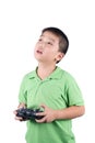 Little boy holding a radio remote control (controlling handset) for helicopter , drone or plane Isolated Royalty Free Stock Photo