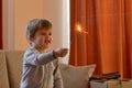 Little boy holding a sparkler Royalty Free Stock Photo