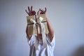 little boy holds a craft gift certificate in his hands Royalty Free Stock Photo