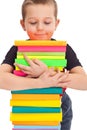 Little boy holds a stack of books Royalty Free Stock Photo