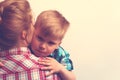 Little boy hugging his mother after sorrow Royalty Free Stock Photo