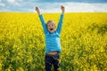 Little boy jumping for joy on a meadow in a sunny day Royalty Free Stock Photo