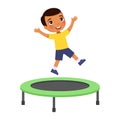 Little boy jumping on trampoline. Happy dark skin sportive child having fun, playing. Royalty Free Stock Photo