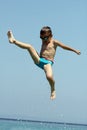 Little boy jumps in sea Royalty Free Stock Photo