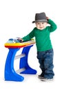 Little boy and the keyboard on white background. funny boy baby. Royalty Free Stock Photo