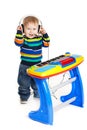 Little boy and the keyboard on white background. Royalty Free Stock Photo