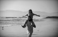 Little boy kid with daddy carrying him on shoulders. Father giving son ride on back outside. Concept of friendly family Royalty Free Stock Photo