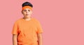 Little boy kid wearing sportswear making fish face with lips, crazy and comical gesture Royalty Free Stock Photo