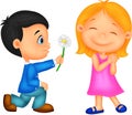 Little boy kneels on one knee giving flowers to girl Royalty Free Stock Photo