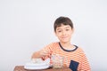 Little boy leaning weight scale mathmatic education in class Royalty Free Stock Photo