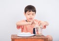 Little boy leaning weight scale mathmatic education in class Royalty Free Stock Photo