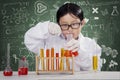 Little boy learning chemistry in the lab