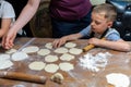 Little boy learning how to make dumplings Royalty Free Stock Photo