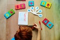 Little boy learning numbers, mental arithmetic, abacus