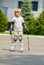 Little Boy learning rollerblading Royalty Free Stock Photo