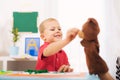 Little boy during lesson with his speech therapist. Royalty Free Stock Photo