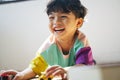 Little boy giggle while playing Royalty Free Stock Photo