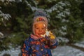 Little boy light a sparkler winter in a snowy forest Royalty Free Stock Photo