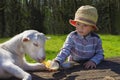 Little boy and little goat