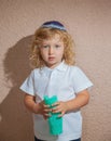 Little boy with long blond curls