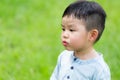 Little boy look at other side with funny face Royalty Free Stock Photo