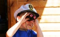 Little boy looking through the binocular Royalty Free Stock Photo