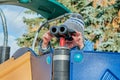 Little boy looking through binoculars on a slide at the Playground. Royalty Free Stock Photo