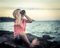 Little boy looking far away with binoculars Royalty Free Stock Photo