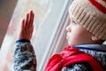 Little boy looking out the window Royalty Free Stock Photo