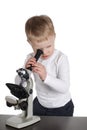 Little boy looking to microscope Royalty Free Stock Photo