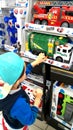 Little boy looking at toys Royalty Free Stock Photo