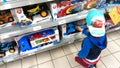 Little boy looking at toys Royalty Free Stock Photo